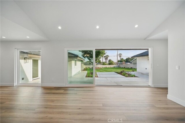 830 Huerta Verde Rd, Glendora, CA 91741 - unfurnished living room with lofted ceiling, wood finished floors, baseboards, and recessed lighting