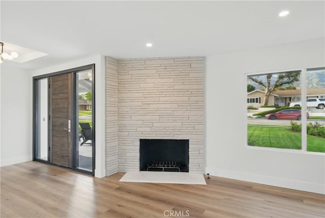 830 Huerta Verde Rd, Glendora, CA 91741 - unfurnished living room featuring wood finished floors, baseboards, a fireplace, and recessed lighting