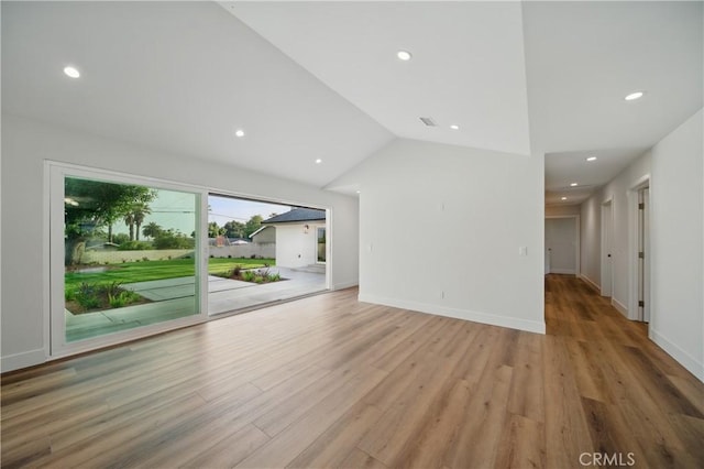 830 Huerta Verde Rd, Glendora, CA 91741 - unfurnished living room featuring light wood-style flooring, vaulted ceiling, recessed lighting, and baseboards