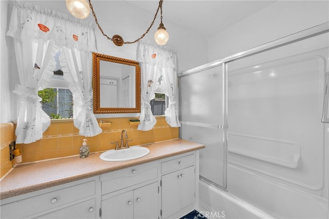 2121 Westminster Ave, Alhambra, CA 91803 - full bathroom with vanity, tasteful backsplash, and combined bath / shower with glass door