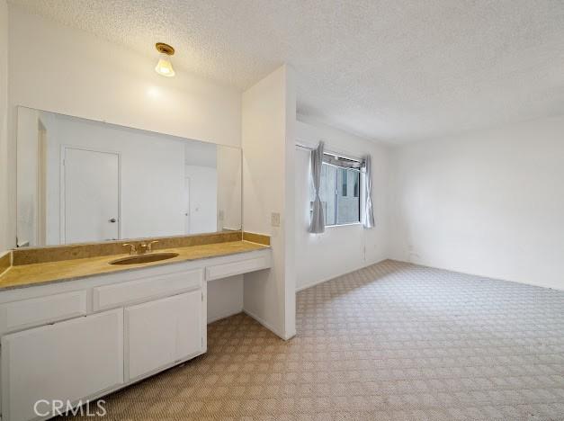 4177 Walnut Grove Ave, Rosemead, CA 91770 - bathroom featuring vanity and a textured ceiling