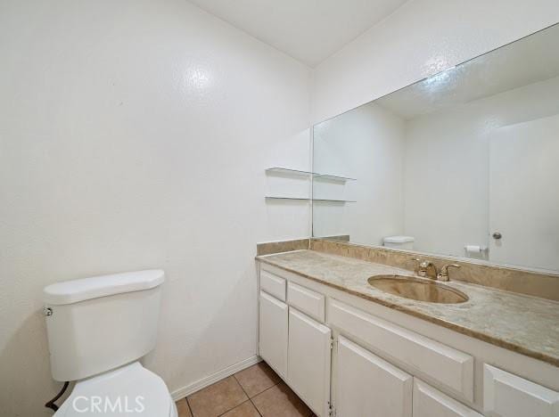 4177 Walnut Grove Ave, Rosemead, CA 91770 - half bath with toilet, vanity, tile patterned flooring, and baseboards