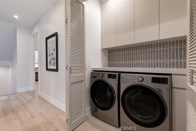 622 1st Pl, Hermosa Beach, CA 90254 - laundry area with washing machine and clothes dryer, light wood-style floors, cabinet space, baseboards, and recessed lighting