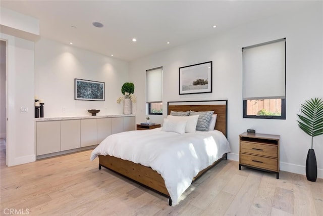 622 1st Pl, Hermosa Beach, CA 90254 - bedroom with light wood-style floors, baseboards, and recessed lighting