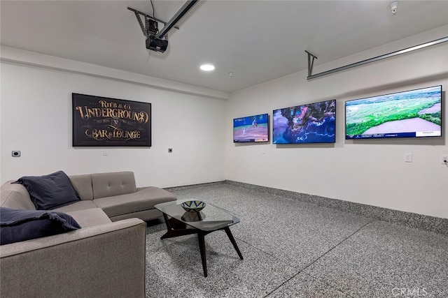 622 1st Pl, Hermosa Beach, CA 90254 - living room with a garage, recessed lighting, speckle patterned floor, and baseboards