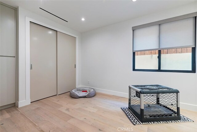 622 1st Pl, Hermosa Beach, CA 90254 - unfurnished bedroom with wood finished floors, recessed lighting, a closet, and baseboards