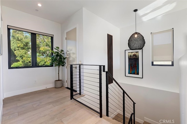 622 1st Pl, Hermosa Beach, CA 90254 - hall with an upstairs landing, light wood finished floors, recessed lighting, and baseboards