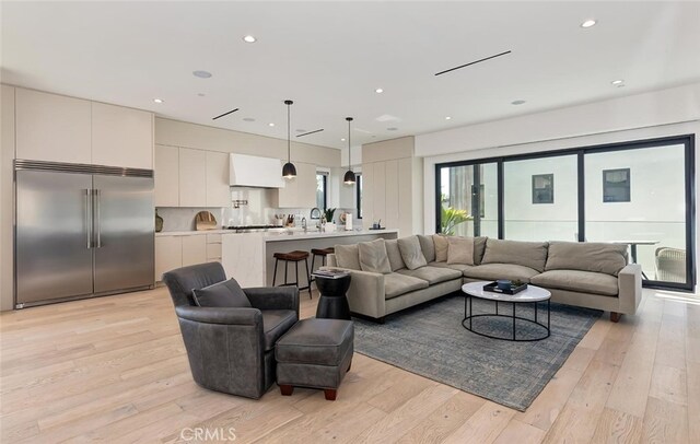 622 1st Pl, Hermosa Beach, CA 90254 - living room with light wood finished floors and recessed lighting