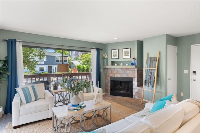 1425 E 2nd St Unit 101, Long Beach, CA 90802 - living room featuring wood finished floors, a brick fireplace, and recessed lighting