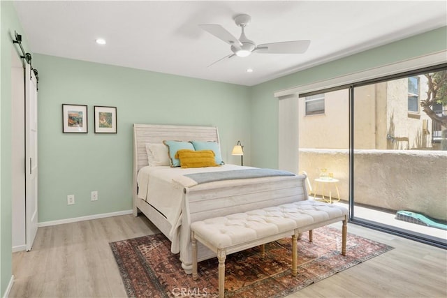 1425 E 2nd St Unit 101, Long Beach, CA 90802 - bedroom with wood finished floors, access to outside, a barn door, ceiling fan, and recessed lighting