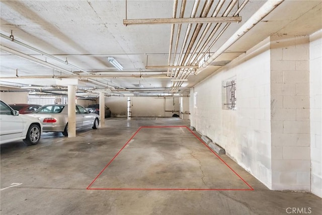1425 E 2nd St Unit 101, Long Beach, CA 90802 - parking deck featuring concrete block wall