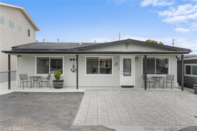 480 Mindoro St, Morro Bay, CA 93442 - back of property featuring roof with shingles and a patio