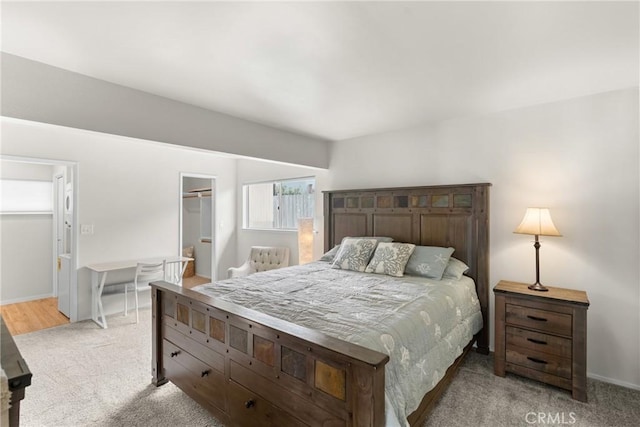 480 Mindoro St, Morro Bay, CA 93442 - bedroom featuring light carpet, a spacious closet, and baseboards