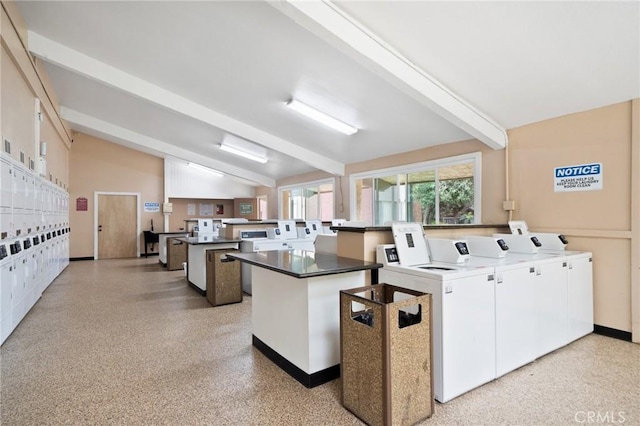 1117 Sepulveda Blvd Unit 2-102, Torrance, CA 90502 - community laundry featuring stacked washer and clothes dryer, independent washer and dryer, and baseboards