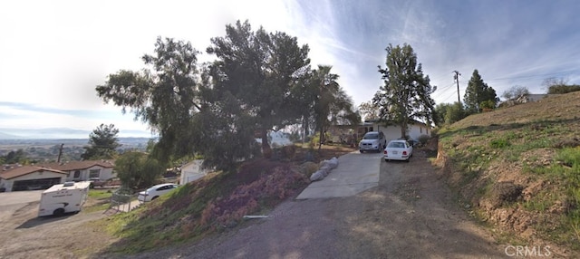 23201 Sprungle Cir, Menifee, CA 92587 - obstructed view of property featuring a residential view