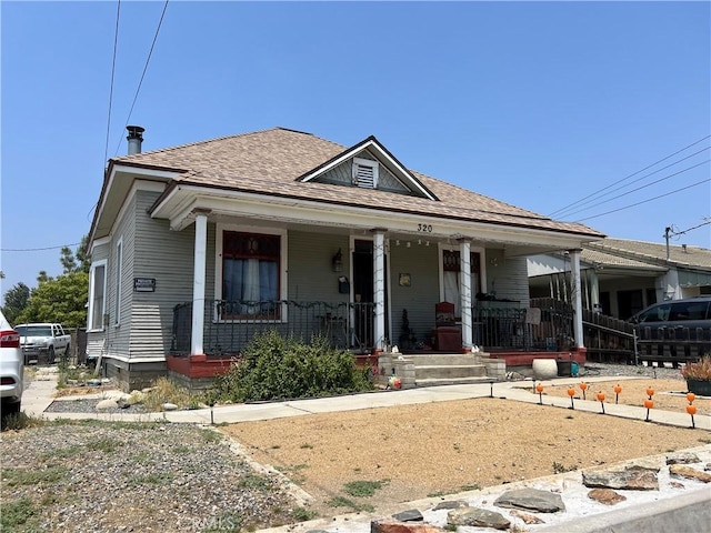 316 W Lugonia Ave, Redlands, CA 92374 - bungalow-style home featuring a porch and a shingled roof