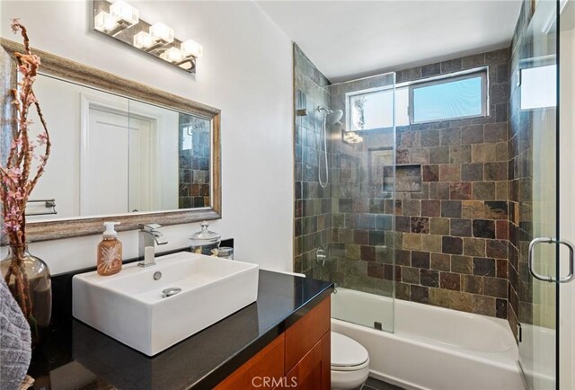 1637 Spreckels Ln, Redondo Beach, CA 90278 - bathroom with vanity, toilet, and shower / bath combination with glass door
