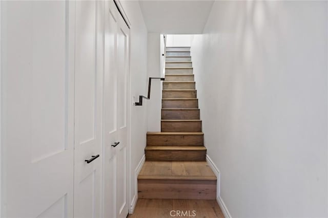 1637 Spreckels Ln, Redondo Beach, CA 90278 - stairs featuring baseboards and wood finished floors