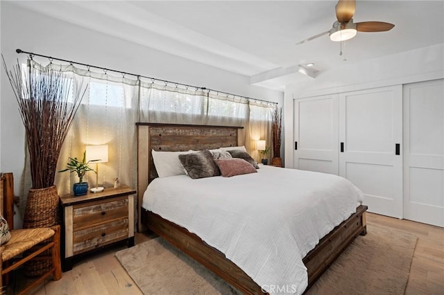 1637 Spreckels Ln, Redondo Beach, CA 90278 - bedroom with multiple windows, light wood-style floors, a closet, and a ceiling fan