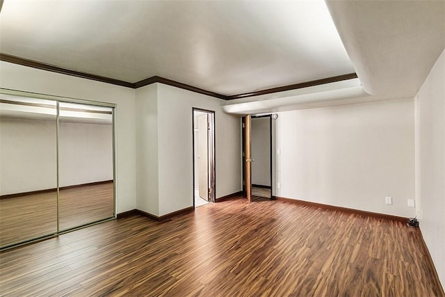 760 Kuffel Canyon Rd, Lake Arrowhead, CA 92385 - unfurnished bedroom with wood finished floors, ornamental molding, and a closet