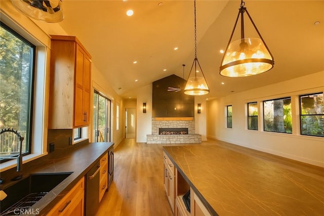 26603 Windward Rd, Lake Arrowhead, CA 92352 - kitchen with dishwasher, dark countertops, light wood finished floors, recessed lighting, and open floor plan