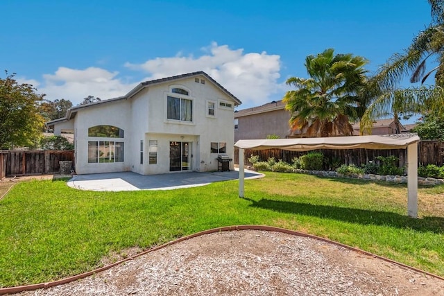43500 Corte Barbaste, Temecula, CA 92592 - rear view of house with stucco siding and a patio area
