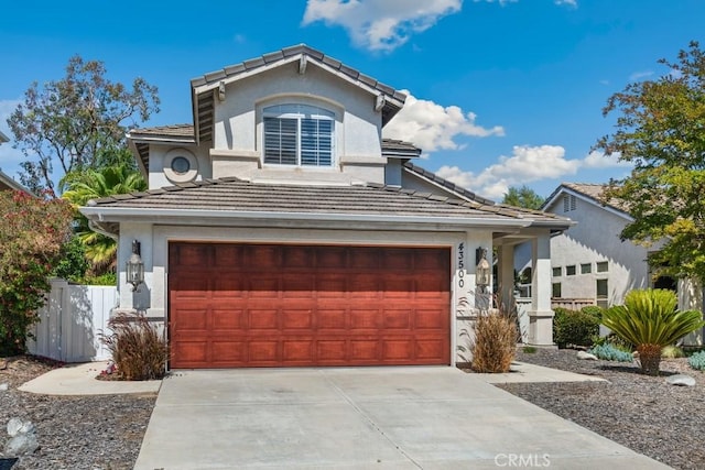 43500 Corte Barbaste, Temecula, CA 92592 - view of front facade featuring a tiled roof, stucco siding, concrete driveway, and a garage