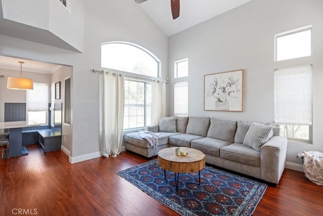 43500 Corte Barbaste, Temecula, CA 92592 - living area with ceiling fan, dark wood-style flooring, high vaulted ceiling, and baseboards