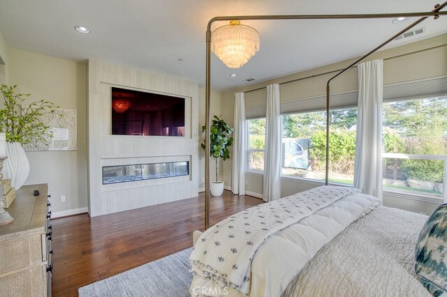 1801 Louise Ln, Nipomo, CA 93444 - bedroom featuring a fireplace, dark wood-type flooring, baseboards, and recessed lighting