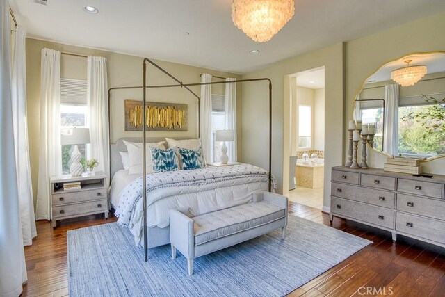 1801 Louise Ln, Nipomo, CA 93444 - bedroom featuring multiple windows, hardwood / wood-style floors, recessed lighting, and ensuite bathroom