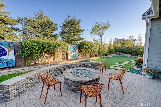 1801 Louise Ln, Nipomo, CA 93444 - fenced backyard featuring a patio area, a fire pit, and a putting green