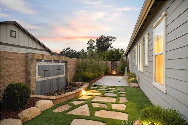 1801 Louise Ln, Nipomo, CA 93444 - fenced backyard featuring a patio area