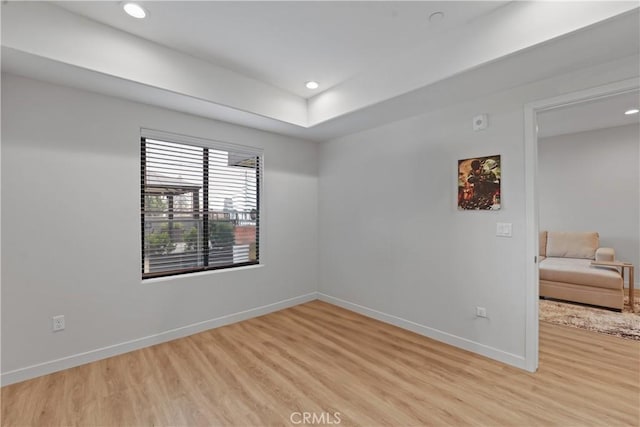 419 N Chandler Ave Unit 305, Monterey Park, CA 91754 - spare room with light wood-type flooring, recessed lighting, and a raised ceiling