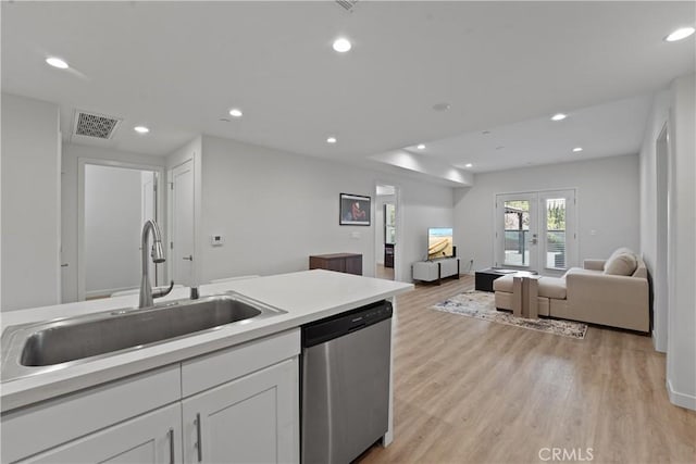 419 N Chandler Ave Unit 305, Monterey Park, CA 91754 - kitchen featuring stainless steel dishwasher, recessed lighting, light wood-style floors, white cabinetry, and open floor plan