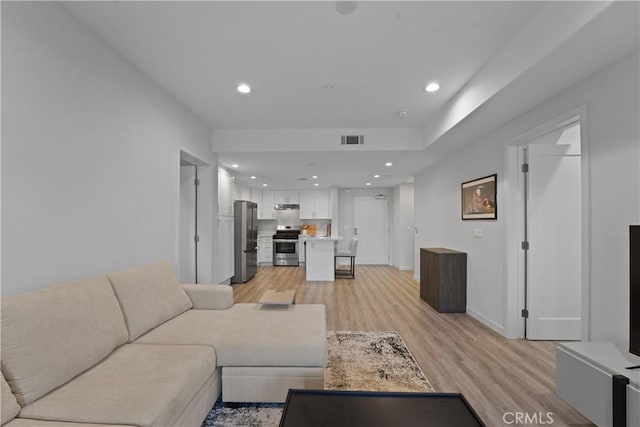 419 N Chandler Ave Unit 305, Monterey Park, CA 91754 - living area with light wood-style floors and recessed lighting