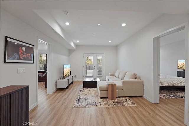 419 N Chandler Ave Unit 305, Monterey Park, CA 91754 - living room with light wood-style floors, recessed lighting, and french doors