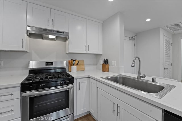 419 N Chandler Ave Unit 305, Monterey Park, CA 91754 - kitchen featuring stainless steel gas range, under cabinet range hood, recessed lighting, white cabinets, and a peninsula