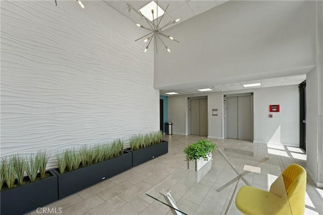 419 N Chandler Ave Unit 305, Monterey Park, CA 91754 - lobby with a towering ceiling and a paneled ceiling