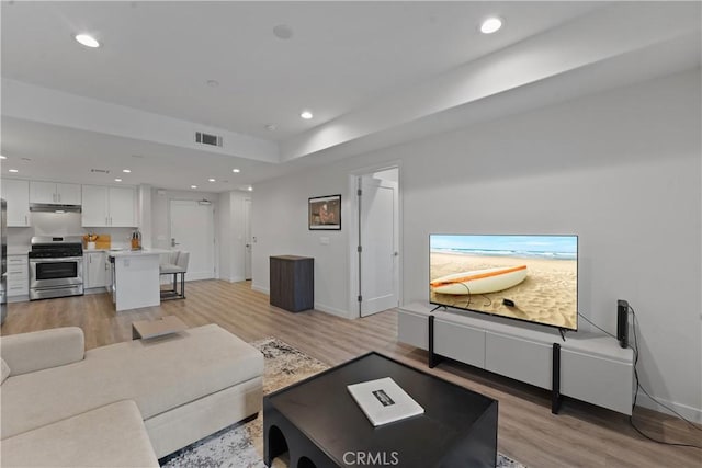 419 N Chandler Ave Unit 305, Monterey Park, CA 91754 - living room featuring light wood-type flooring and recessed lighting