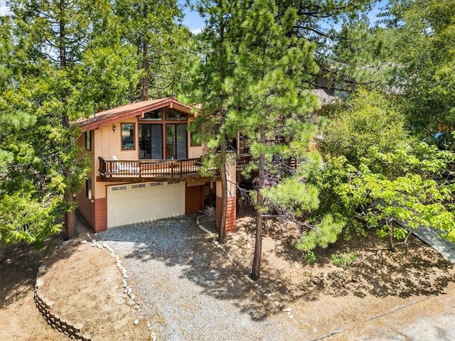 26823 Crestview Dr, Idyllwild, CA 92549 - rustic home with driveway and an attached garage