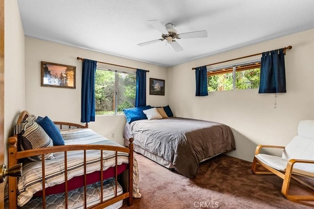 26823 Crestview Dr, Idyllwild, CA 92549 - carpeted bedroom featuring multiple windows and a ceiling fan