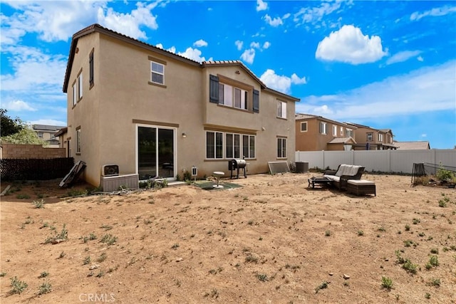 28341 Heather Green Way, Menifee, CA 92584 - rear view of house featuring a fenced backyard and stucco siding