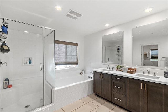28341 Heather Green Way, Menifee, CA 92584 - full bathroom with a bath, a stall shower, double vanity, tile patterned floors, and recessed lighting