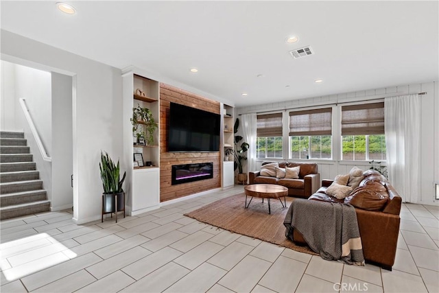 28341 Heather Green Way, Menifee, CA 92584 - living room featuring a fireplace, recessed lighting, and stairway