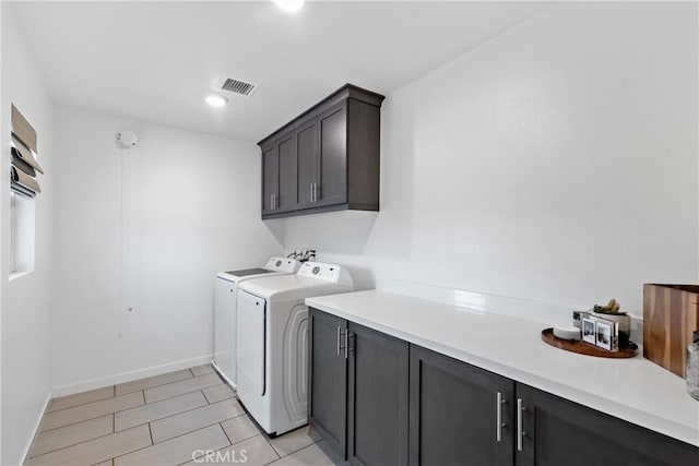 28341 Heather Green Way, Menifee, CA 92584 - laundry room with cabinet space, separate washer and dryer, and baseboards