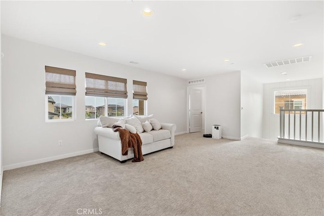 28341 Heather Green Way, Menifee, CA 92584 - living room featuring healthy amount of natural light, light colored carpet, recessed lighting, and baseboards