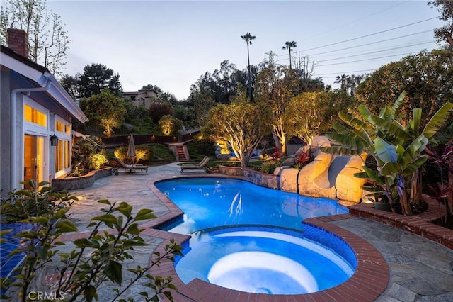 25611 Rangewood Rd, Laguna Hills, CA 92653 - view of pool featuring a pool with connected hot tub and a patio area