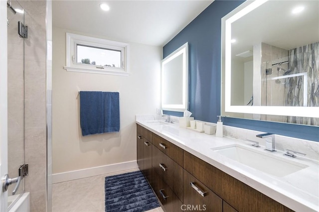 25611 Rangewood Rd, Laguna Hills, CA 92653 - full bath featuring an enclosed shower, double vanity, baseboards, tile patterned flooring, and recessed lighting