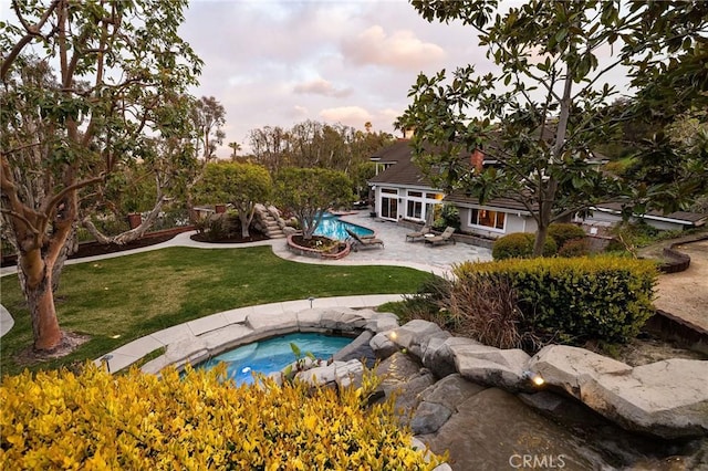 25611 Rangewood Rd, Laguna Hills, CA 92653 - view of pool featuring a patio, a lawn, and a hot tub