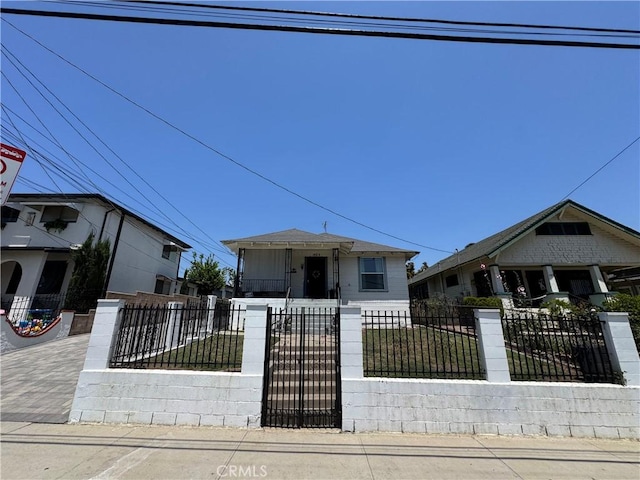 1521 Bridge St, Los Angeles, CA 90033 - bungalow with a fenced front yard and a porch